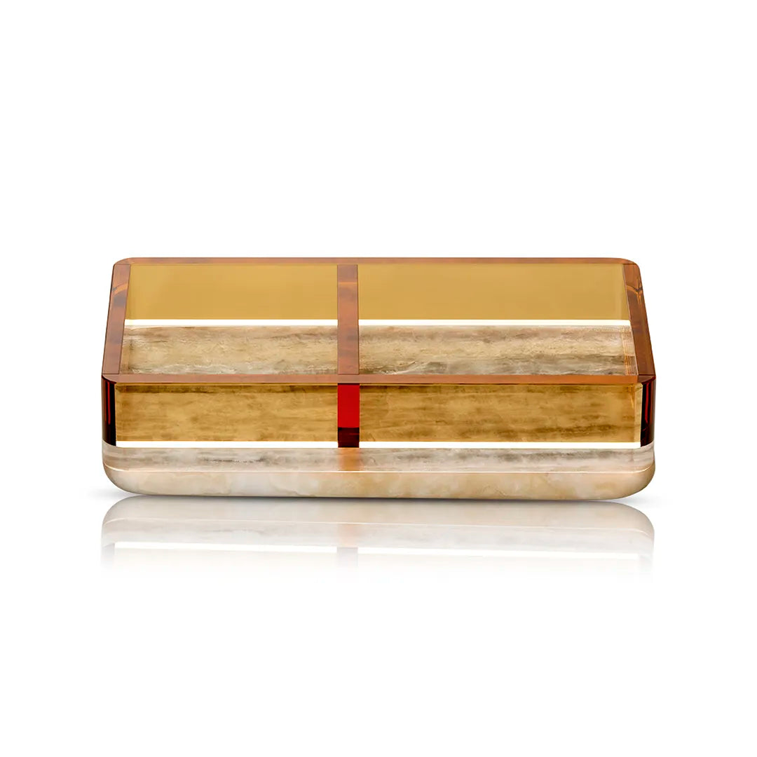 A close-up of the Treasures Tray, showcasing its two compartments, amber crystal lid, and natural onyx base, against a white background.